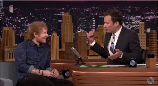 Ed Sheeran being interviewed by Jimmy Fallon.